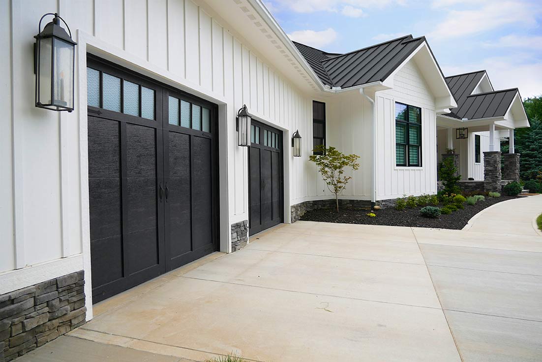 Modern black garage door installation in Elkhart, IN