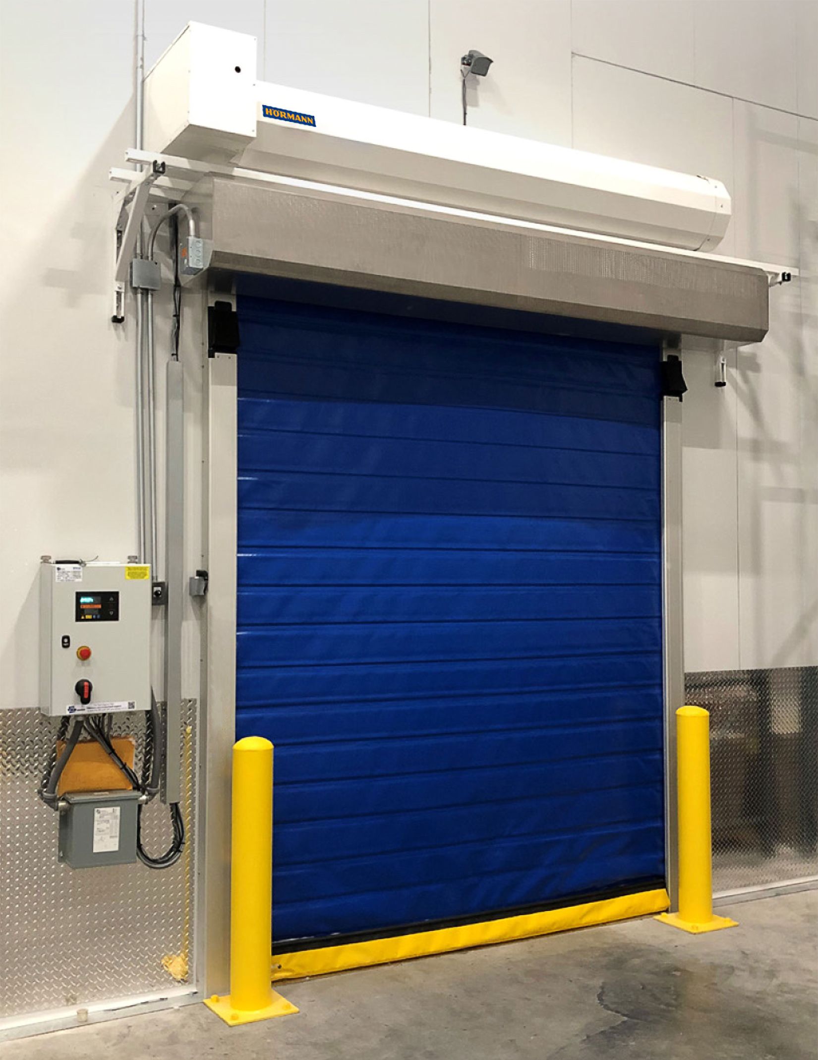 Steel roll up garage door in a South Bend, IN, business warehouse